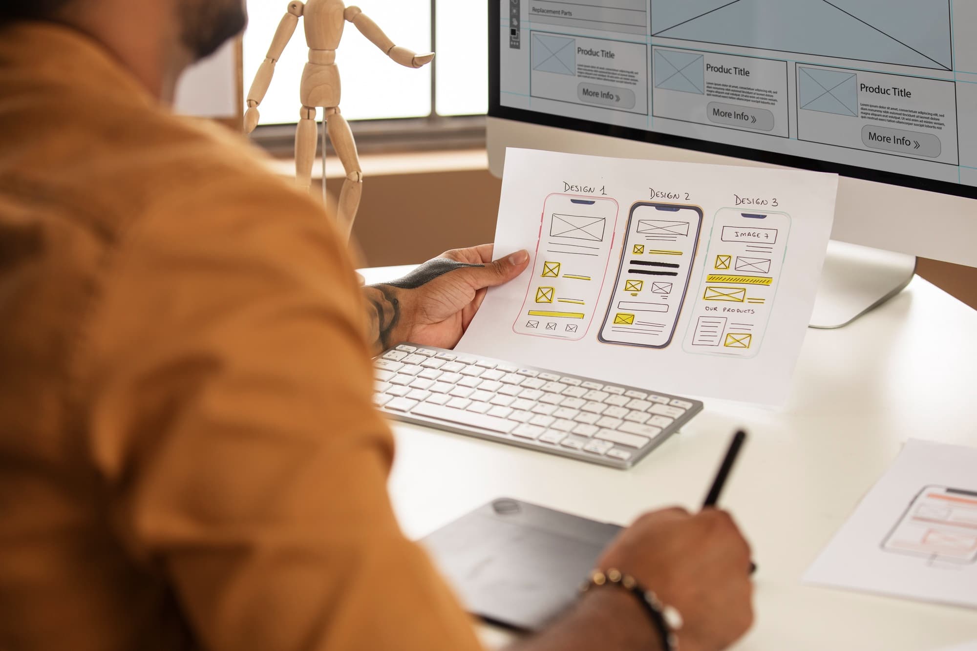 Designer working on wireframes